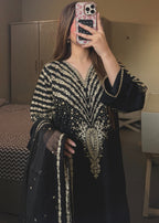 Black Peacock embroidered suit by Tehzeeb Libas