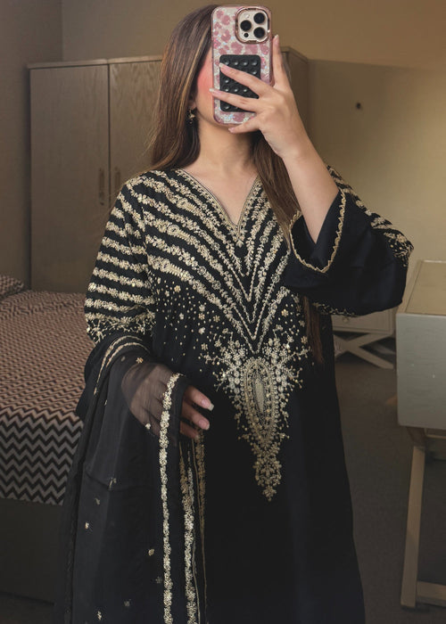 Black Peacock embroidered suit by Tehzeeb Libas