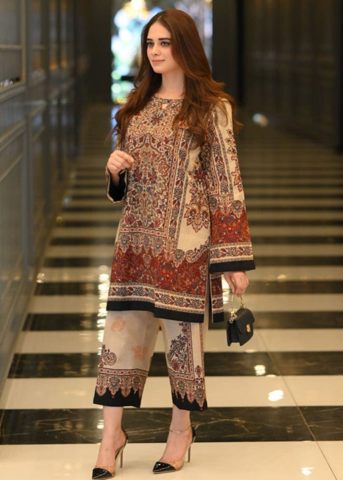 Regal Rust stitched eastern suit by Tehzeeb Libas